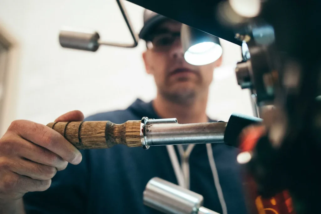 Technician servicing equipment